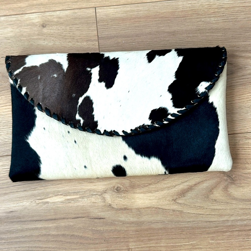 Calf hair print clutch.